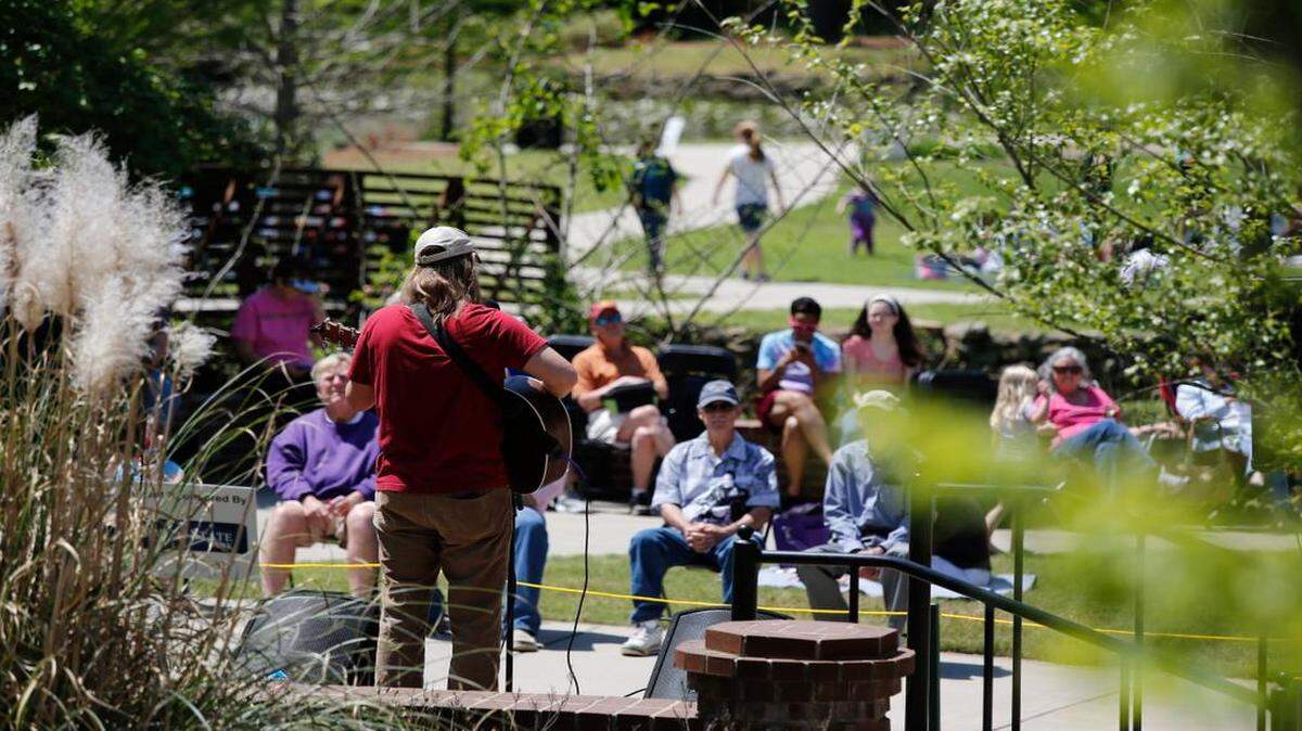 
Chase Killough, above and below, entertains in Glencairn Garden in Rock Hill Wednesday. He performed songs by Elton John, Neal Young, Jimi Hendrix, Eric Clapton and others.

