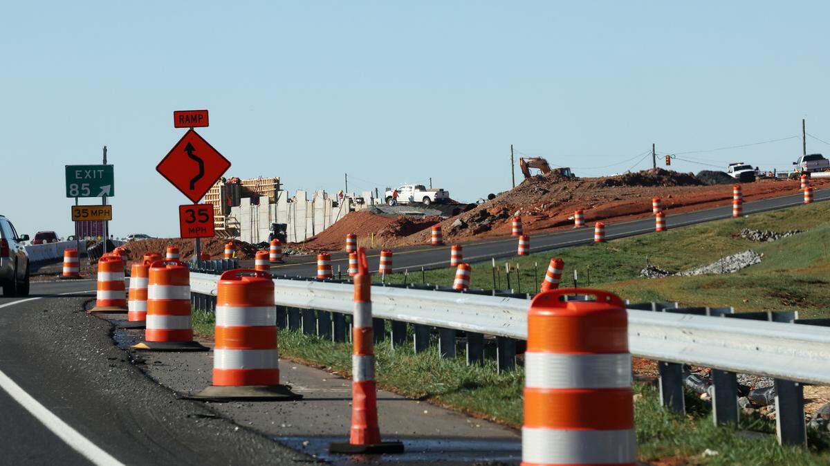 Crews work near the Hwy. 160 exit on I-77 Tuesday in Fort Mill.