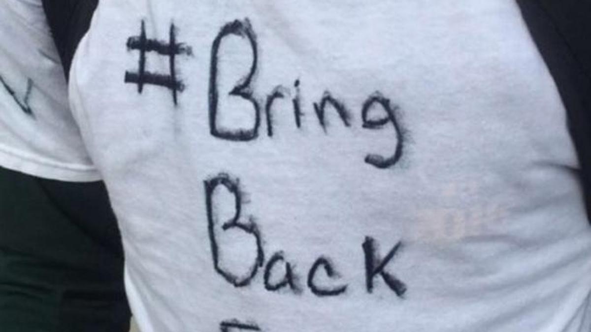 Twitter user @LilCee_MEDIC tweeted this photo Thursday telling students to “Wear white shirt tomorrow and write BRING FIELDS Back!!! #bringbackfields.”
