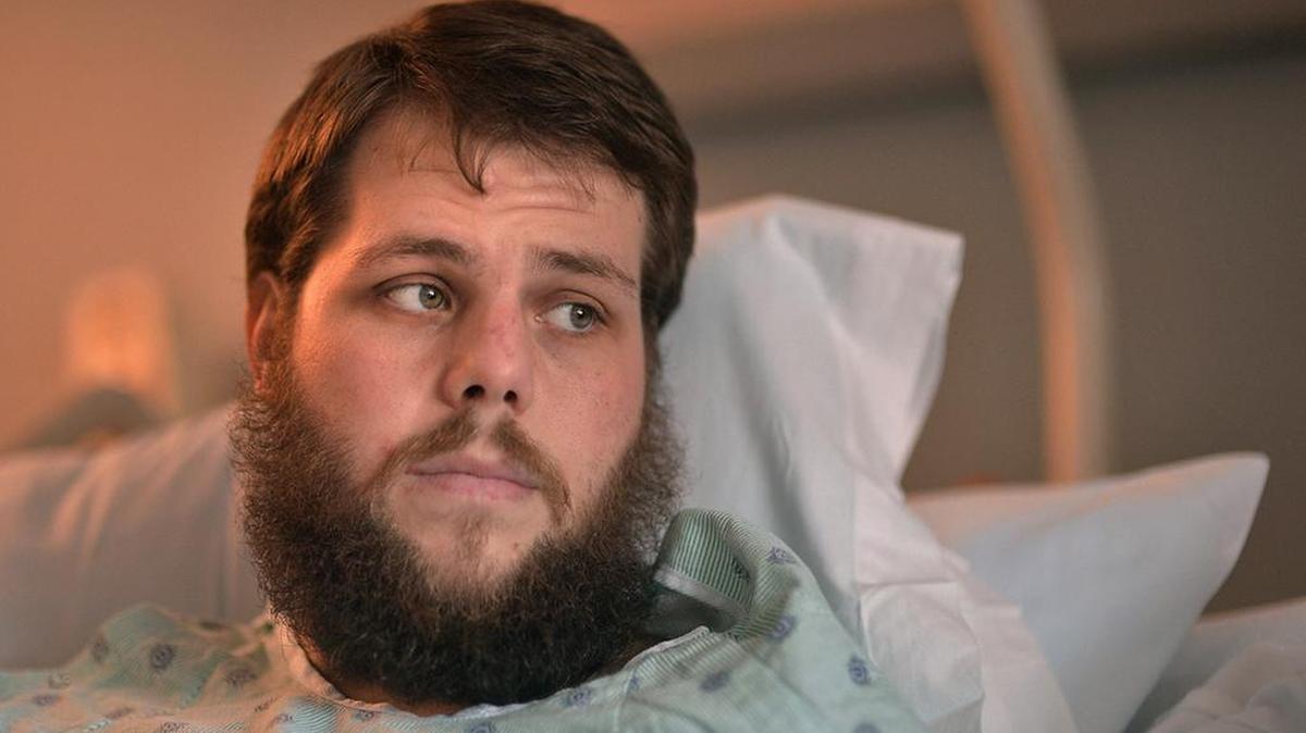 Josh Turner spent two days in a ditch after crashing his truck before he crawled onto a road to find help.
