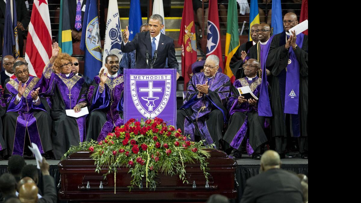 
The casket of Rev. Clementa Pinckney sits beneath the podium as President Barack Obama delivers the eulogy during his funeral service, Friday in Charleston.
