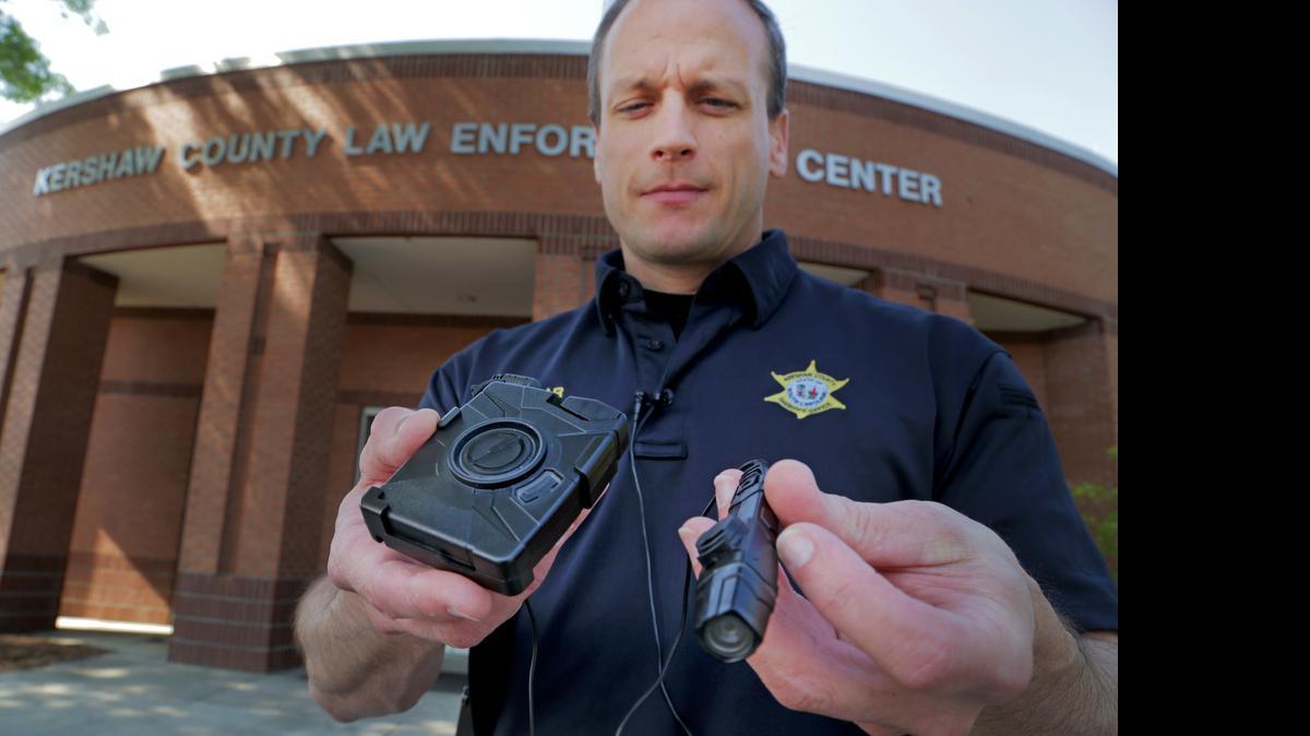 
Lt. Danny Templar describes the Taser Axon Flex Body police camera. Kershaw County sheriff's deputies will soon be using the cameras. 
