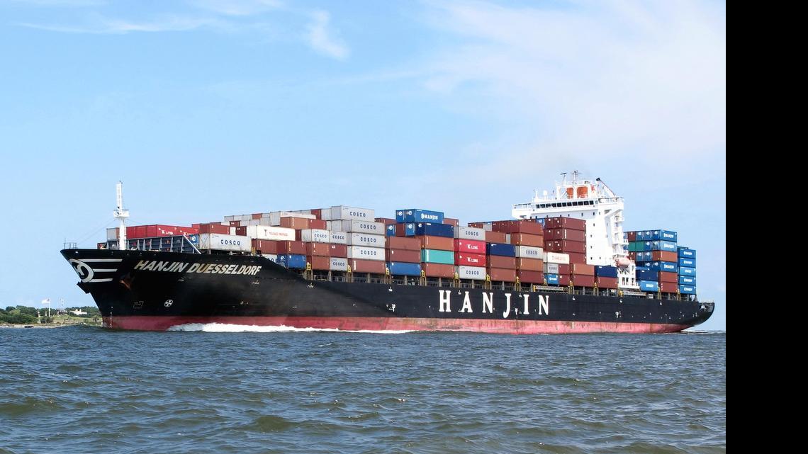 
A container ship moves through the harbor in Charleston, which is in the midst of a half-billion dollar deepening project. 


