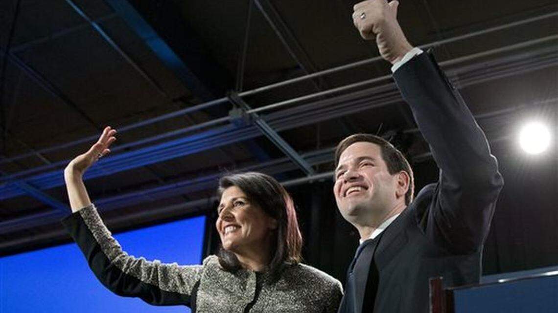 Republican presidential candidate Sen. Marco Rubio, R-Fla,, and Gov. Nikki Haley wave to the crowd after speaking at an election-night rally in Columbia, S.C., Saturday, Feb. 20, 2016.