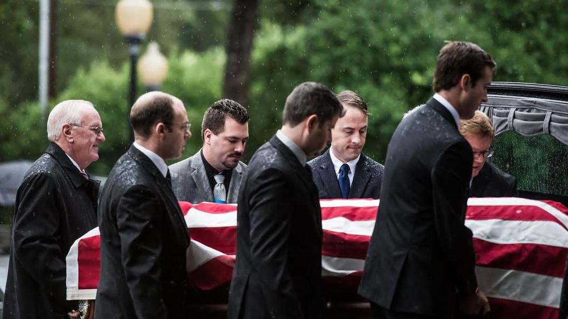 
Pallbearers carry the body of slain Forest Acres police officer Greg Alia during Saturday’s funeral at St. Joseph Catholic Church.
