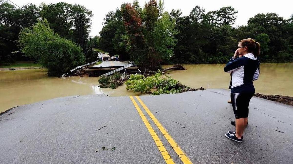 
Rockbridge Drive Bridge broke because of water that rushed through it after an Arcadia Lakes dam broke. A dam at Overcreek Road on Forest Lake also failed.
