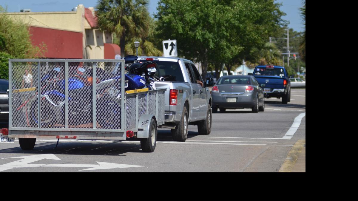 
Atlantic Beach Memorial Day Bikefest participants pack up and roll out of town Monday. 
