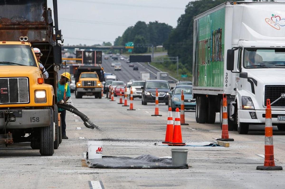 S.C. DOT workers make repairs to the Interstate 77 bridge over the Catawba River in this 2015 file photo.