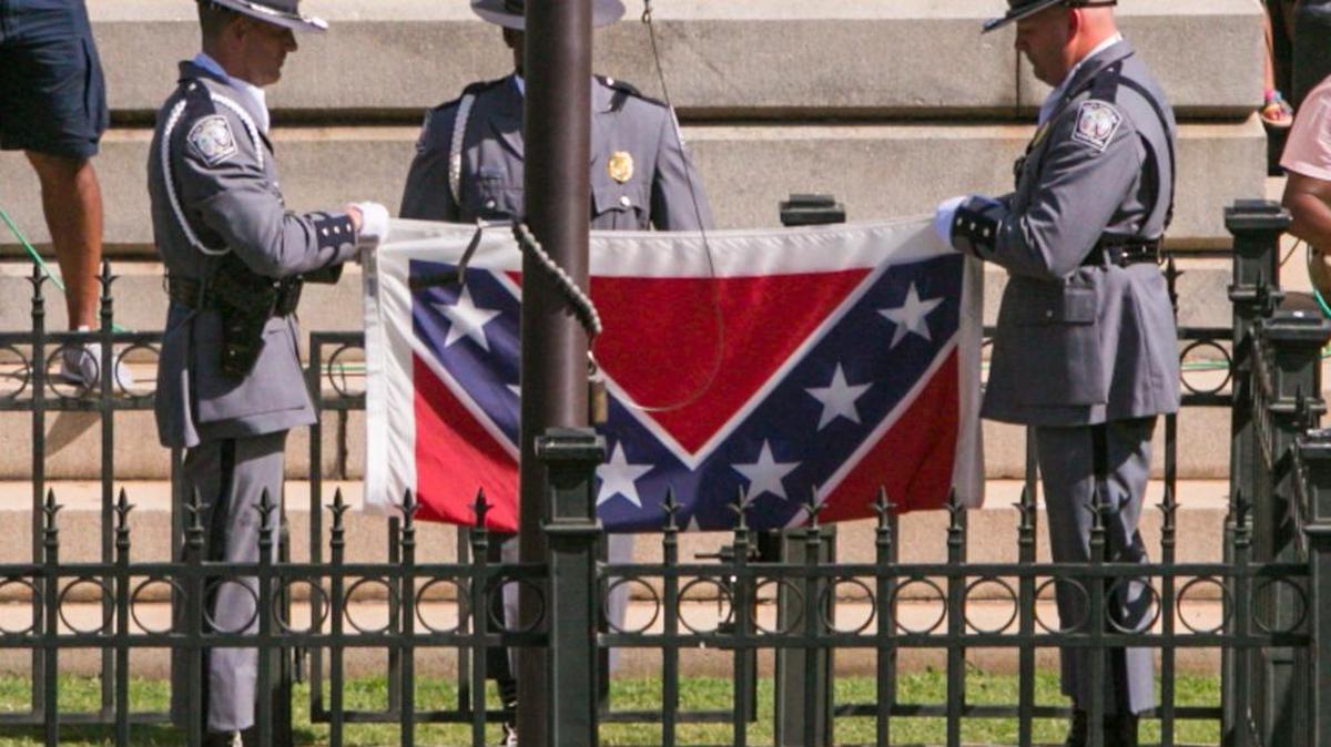 
The South Carolina Highway Patrol Honor Guard removed the Confederate Battle Flag from the State House grounds during a ceremony in July.
