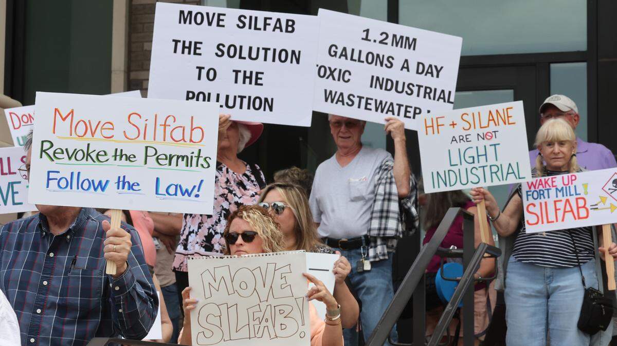 Demonstrators protest the Silfab Solar Monday at the York County Government Center in York before the York County Council meeting. The demonstrators are opposed to Silfab operating in a light industrial zoned area of Fort Mill.