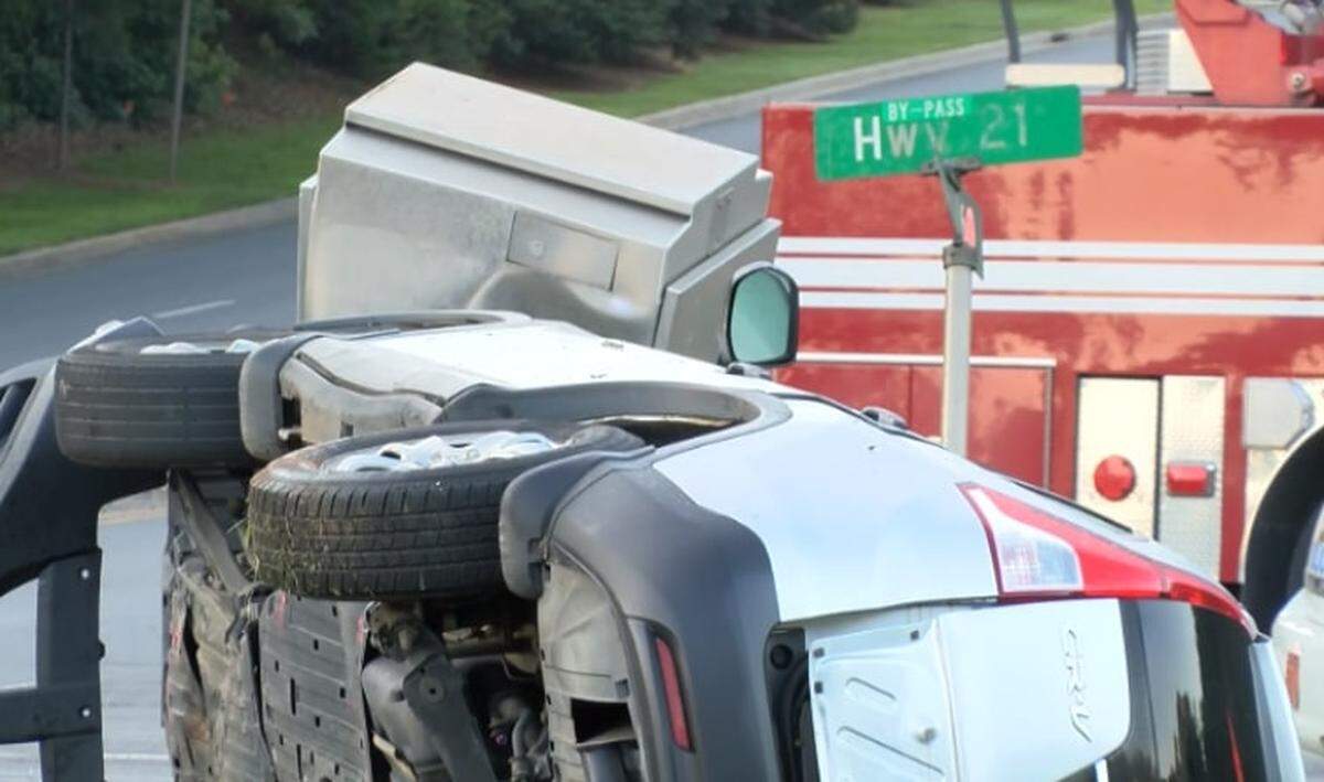 A main commuter route between Rock Hill and Charlotte remained closed Wednesday morning after a crash following a police chase from North Carolina into South Carolina.