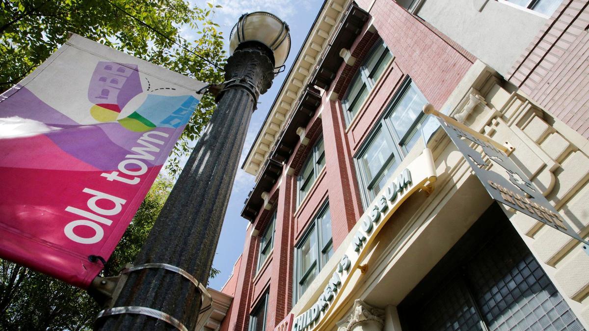 An “Old Town” flag hangs near the Children’s Museum in downtown Rock Hill on Thursday. New U.S. Census Bureau data shows how Rock Hill compares with the biggest cities in South Carolina and Charlotte.