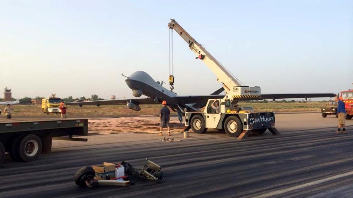 A crashed MQ-9 Reaper drone seen on the ground in Niamey, Niger, in West Africa on Oct. 20, 2014. The investigation determined the cause of the accident to be pilot error.