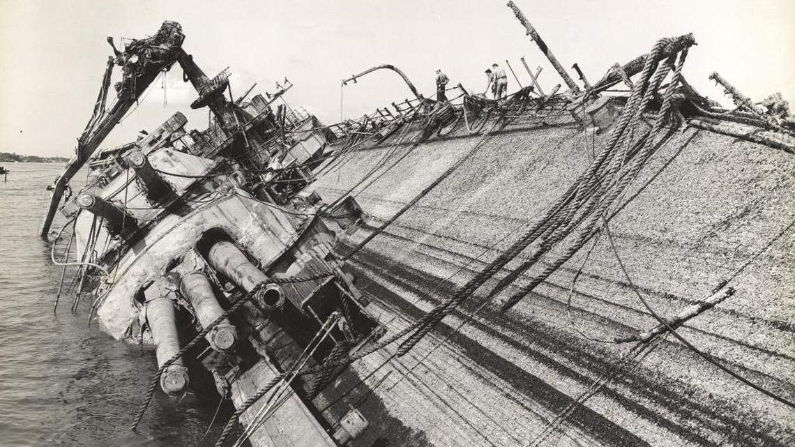 The USS Oklahoma was sunk by several bombs and torpedoes during the Japanese attack on Pearl Harbor. A total of 429 crew died when the ship capsized.