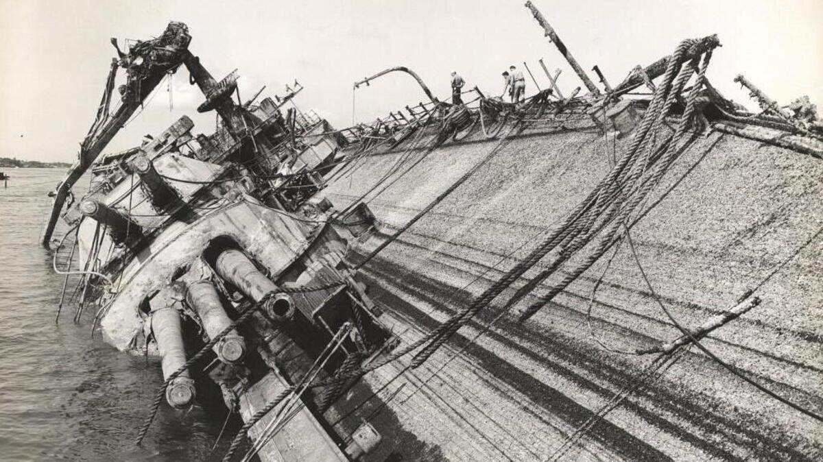 The USS Oklahoma was sunk by several bombs and torpedoes during the Japanese attack on Pearl Harbor. A total of 429 crew died when the ship capsized.