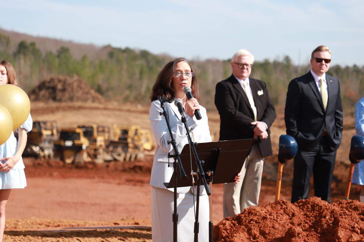 In this file photo, Clover School District superintendent Sheila Quinn gives her remarks at the groundbreaking ceremony for Lake Wylie High School. The school is set to open in 2026.