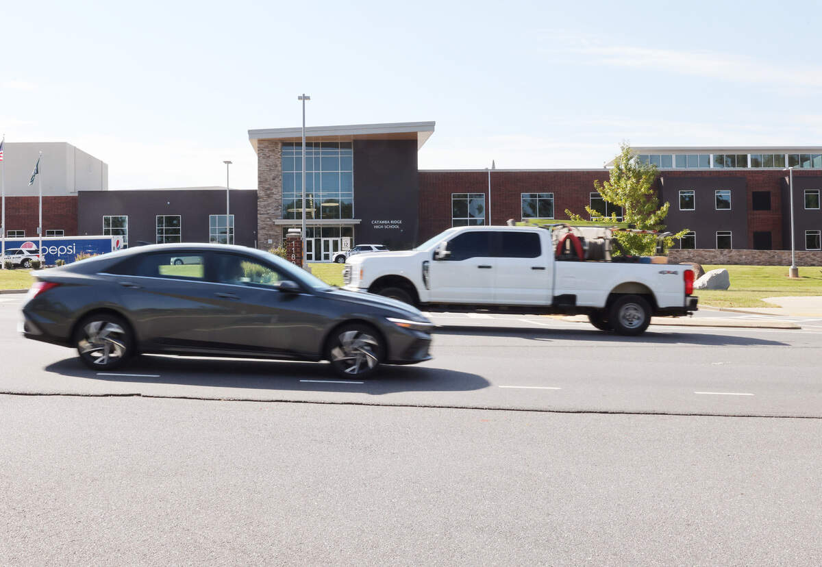 A crossing guard outside Catawba Ridge High School in Fort Mill was injured after being struck by a vehicle last fall. A temporary traffic signal will be placed in front of the school, the town announced Monday.