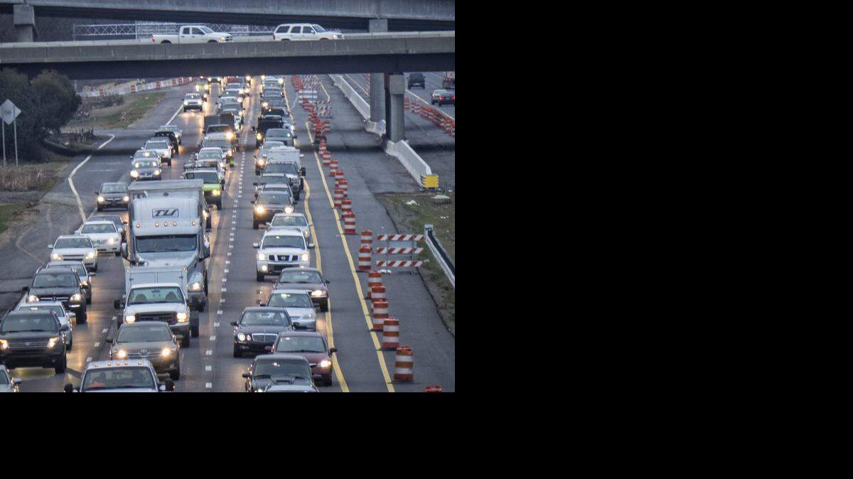 
Traffic backs up on I-485 just before 5 p.m. on January 14 in this photo take from a bridge under construction on North Community House Road overlooking the beltline between Johnston Road and Rea Road. 
