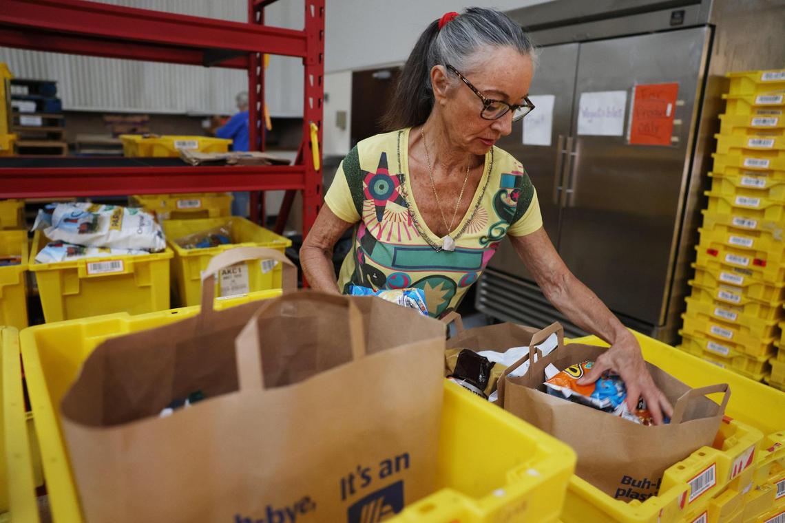 Linda Greenwald loads bags with groceries Monday, July 21, 2025 at HOPE in Rock Hill, S.C.
