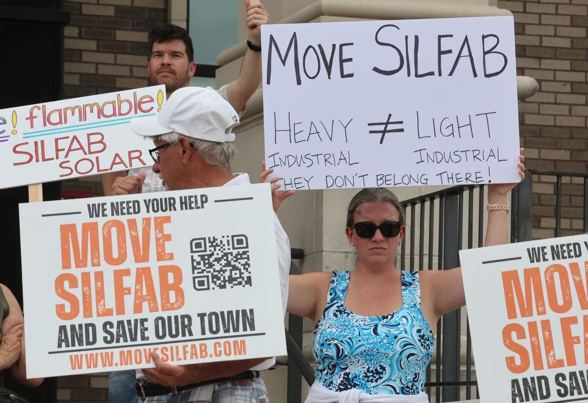 Demonstrators protest the Silfab Solar Monday at the York County Government Center in York before the York County Council meeting. The demonstrators are opposed to Silfab operating in a light industrial zoned area of Fort Mill.