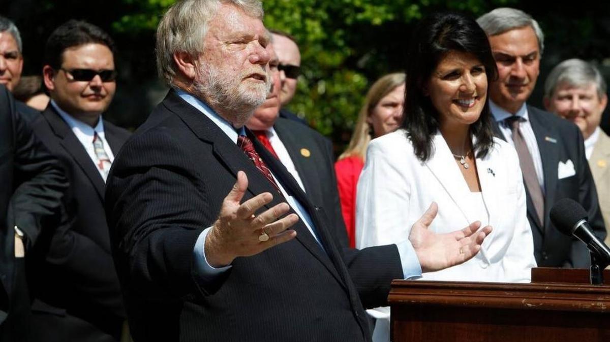 
Commerce Secretary Bobby Hitt is joined by Gov. Nikki Haley and state officials outside the Governor’s Mansion on May 11 as they make it official by announcing Volvo will build a $500 million factory in Berkeley County to produce 100,000 cars a year. 
