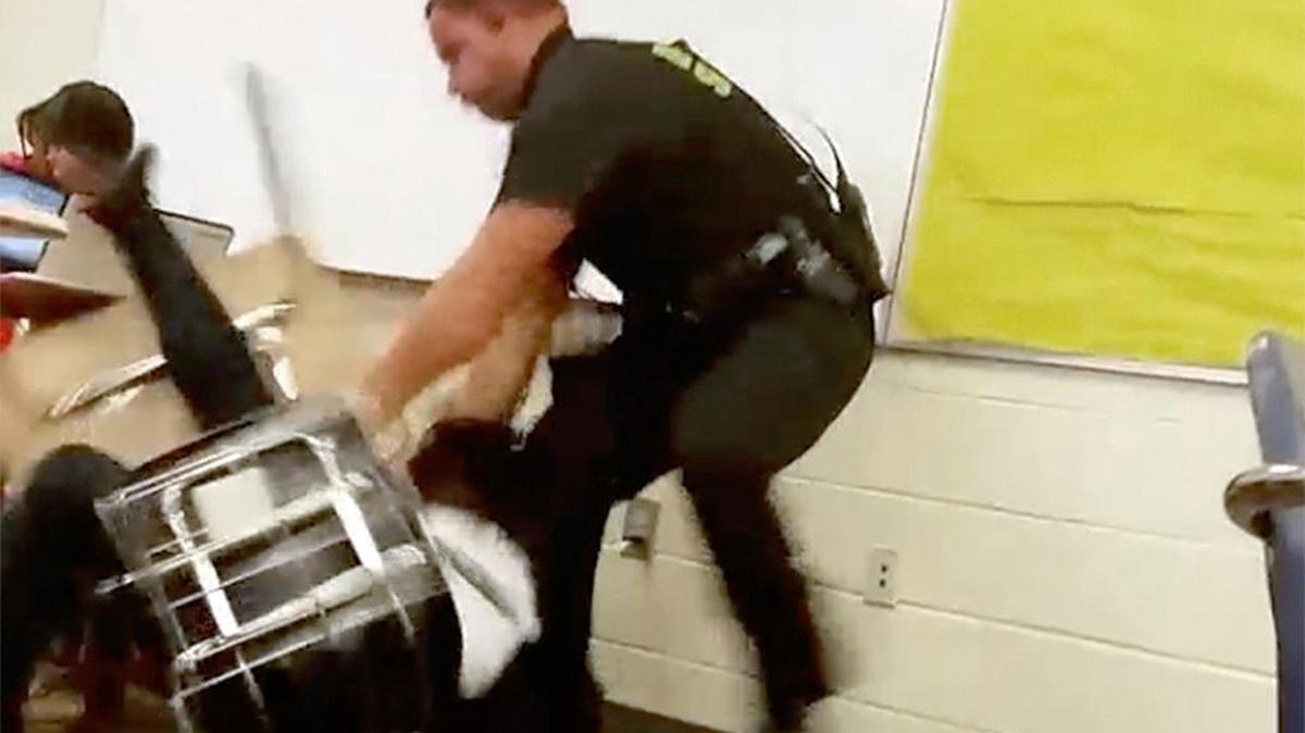 A photo of the video taken by a Spring Valley High School student shows senior Richland County Sheriff’s Deputy Ben Fields trying to forcibly remove a student who refused to leave her math class.