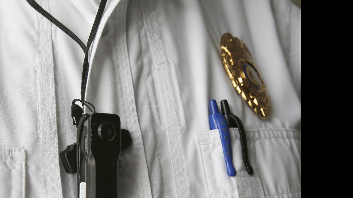 
Lt. John Poole, administrative lieutenant and training and standards officer with the Chester Police Department, shows a body camera that Chester officers wear.
