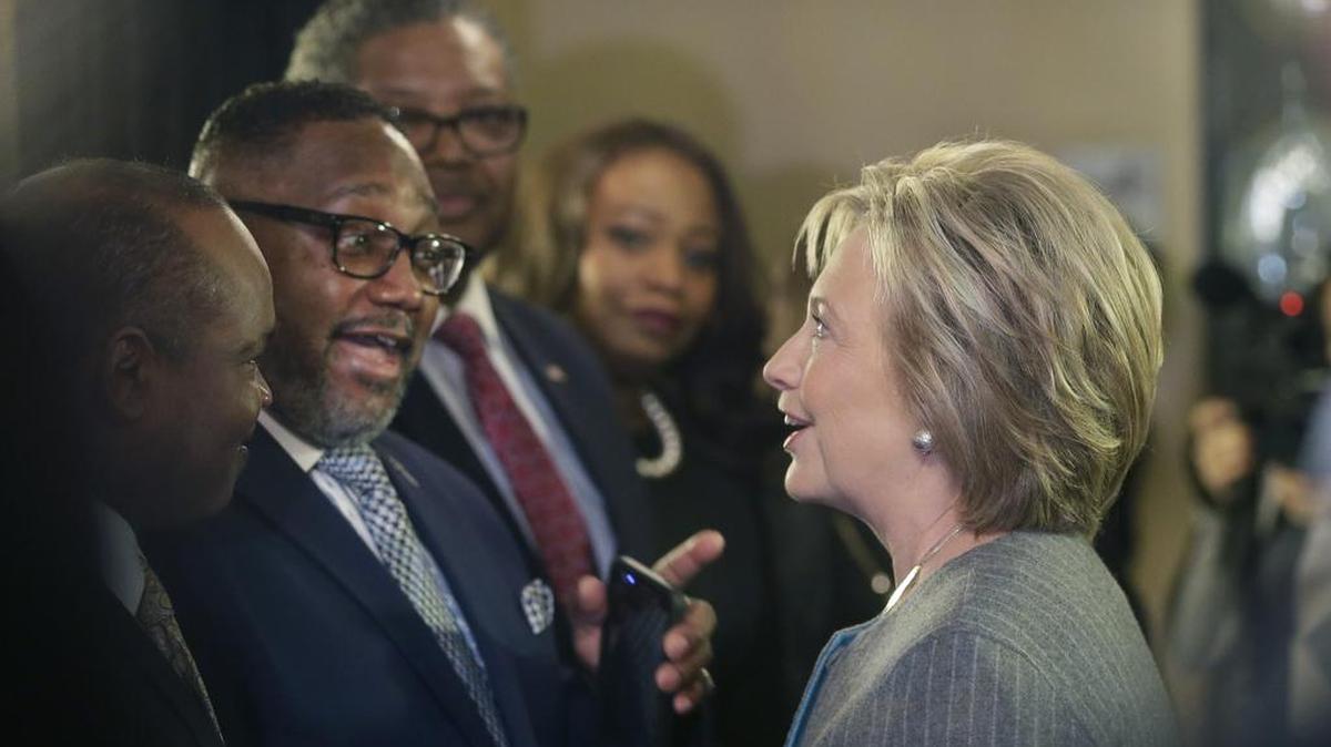 Hillary Clinton meets with The Rev. Kenneth J. Flowers before speaking with African American ministers, Saturday.