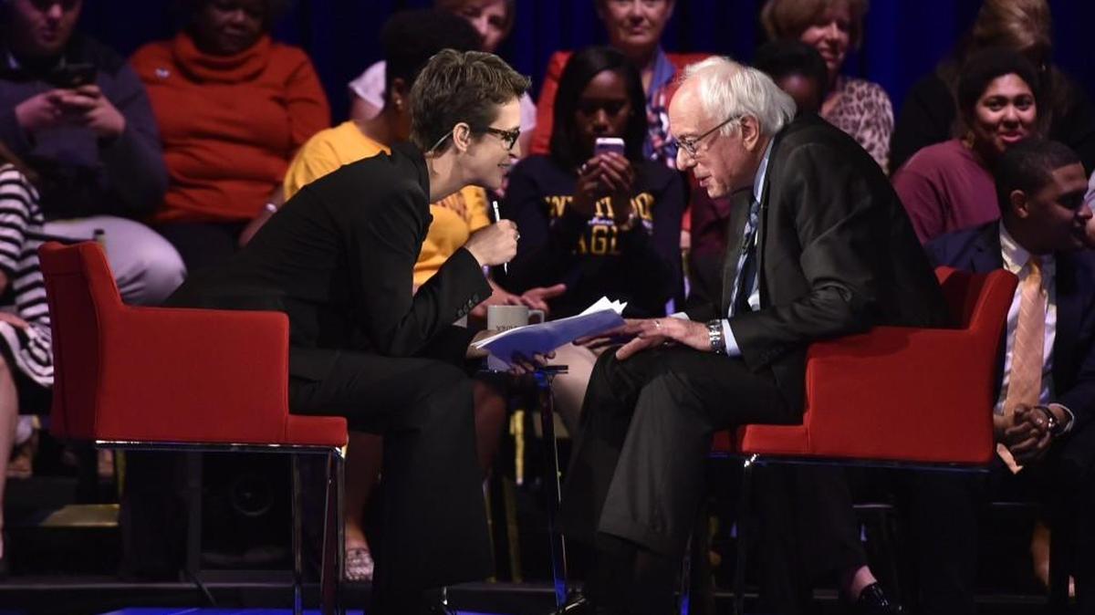 Moderator Rachel Maddow speaks with Vermont Sen. Bernie Sanders, who has described himself as a democratic socialist, during the Nov. 6 Democratic presidential forum at Winthrop University.