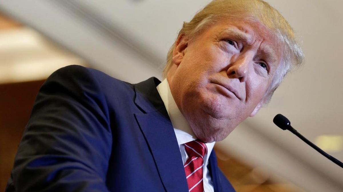 
Republican presidential candidate Donald Trump pauses while speaking about his tax plan during a news conference, Monday, Sept. 28, 2015, in New York. The Republican front-runner is calling for an overhaul of the tax code that would eliminate income taxes for millions of Americans, while lowering them for the highest-income earners and business.
