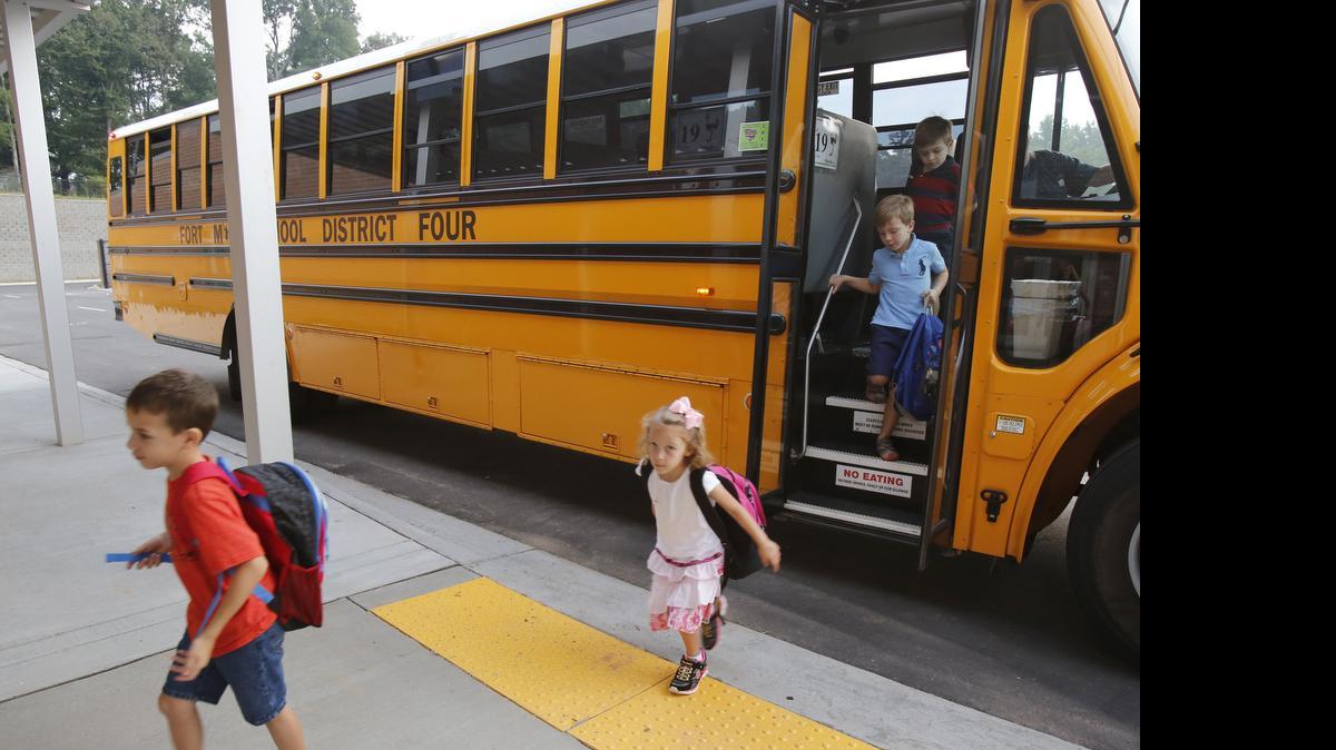 
Students arrive at Doby’s Bridge elementary school for the first day of classes this year. The proposed bond sale calls for funds to build a new middle and high school. 
