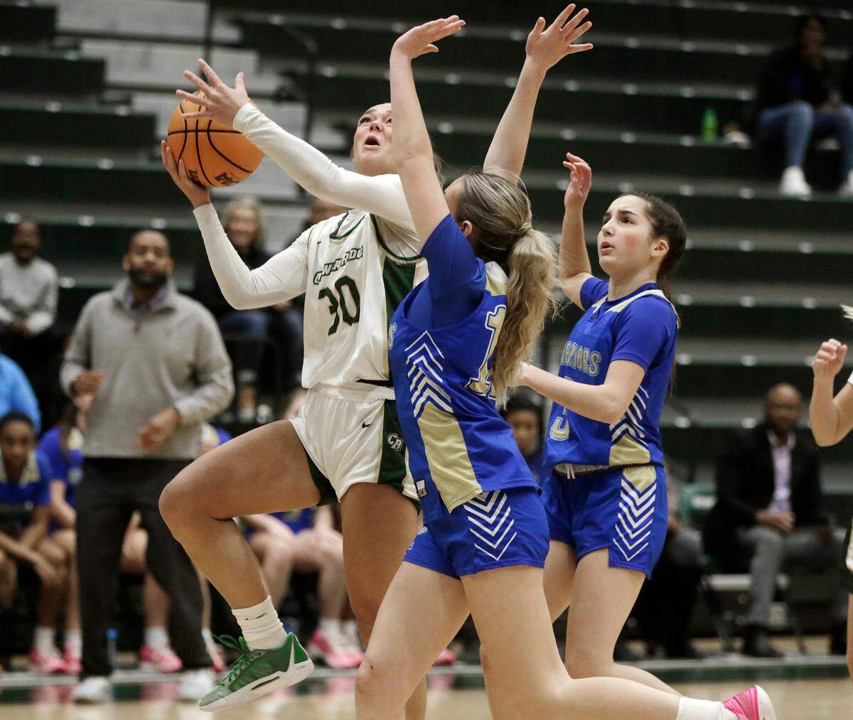 Catawba Ridge’s Morgan Davis (30) heads to the basket against Indian Land’s Lucy Kilpatric (12).