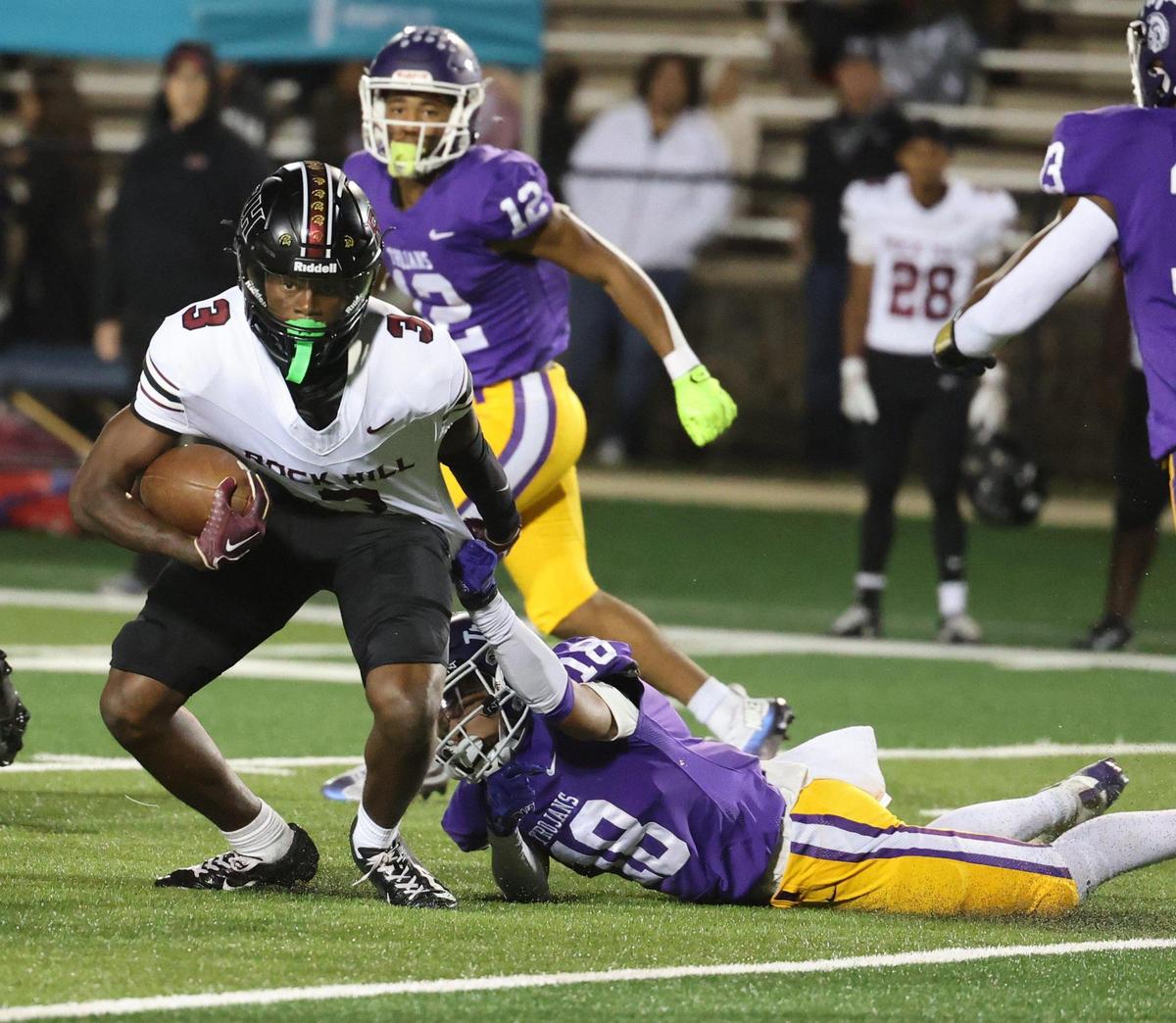 Northwestern’s Jayden Baxter pulls down Rock Hill’s Malik Clark Friday, Oct. 18, 2024 in Rock Hill, S.C.