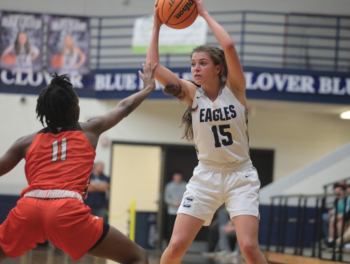 Clover’s Lauren Deal (15) looks for an opening around Mauldin’s Ashia Austin.