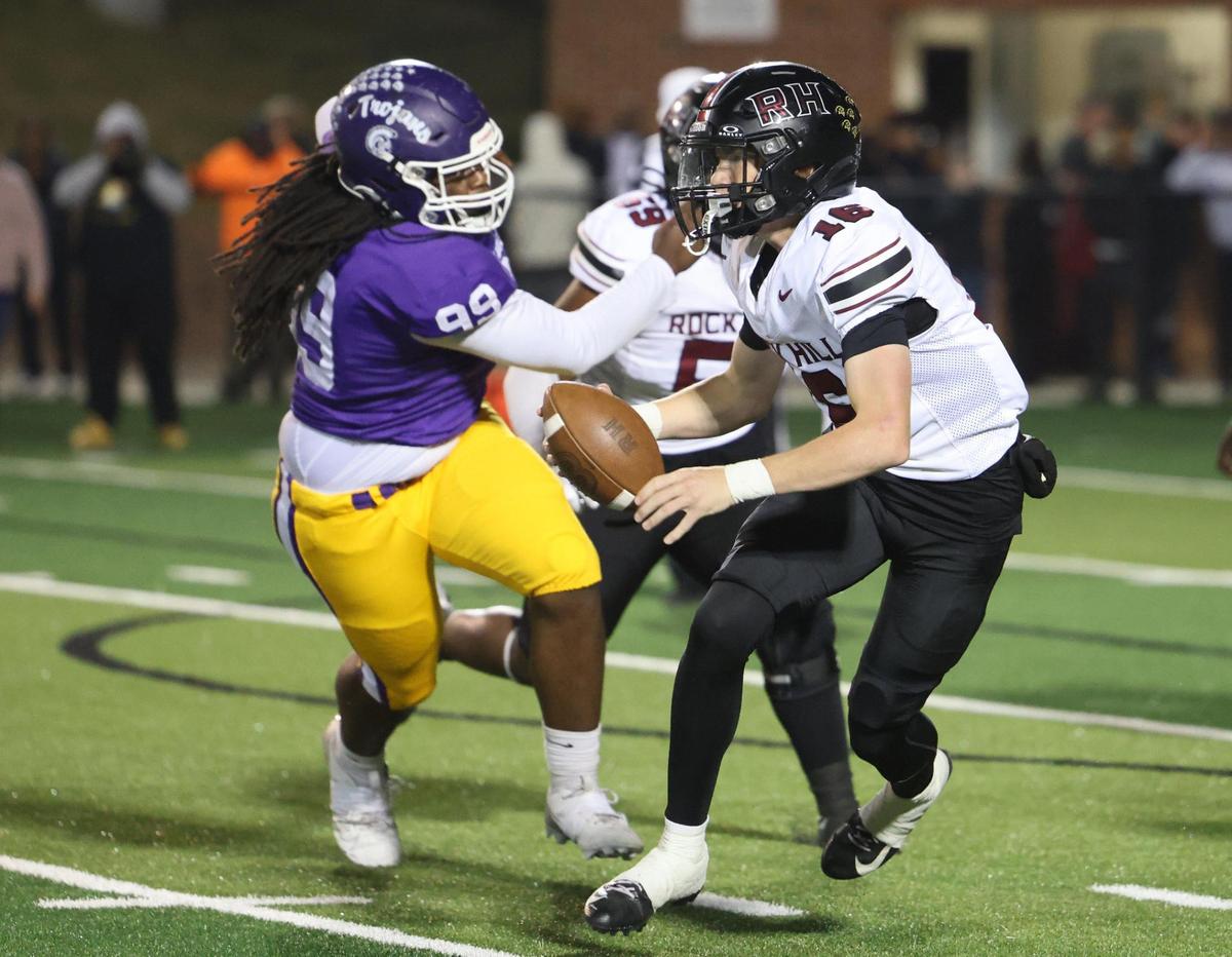 Rock Hill’s Jonah Young carries the ball against Northwestern’s Andre Pickett Friday, Oct. 18, 2024 in Rock Hill, S.C.
