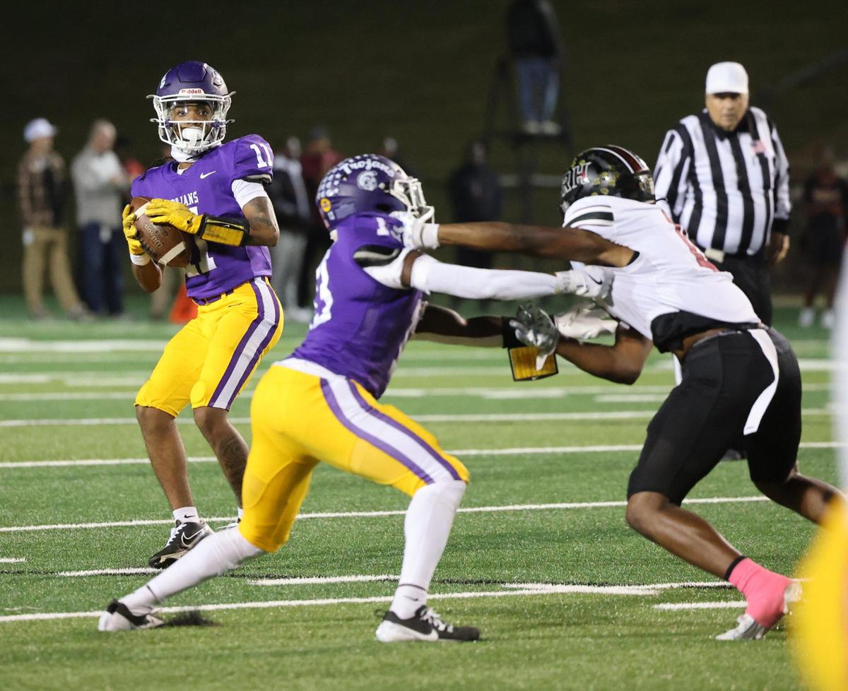 Northwestern’s Evan Harrison looks for an opening Friday, Oct. 18, 2024 as the Trojans take on the Rock Hill Bearcats in Rock Hill, S.C.