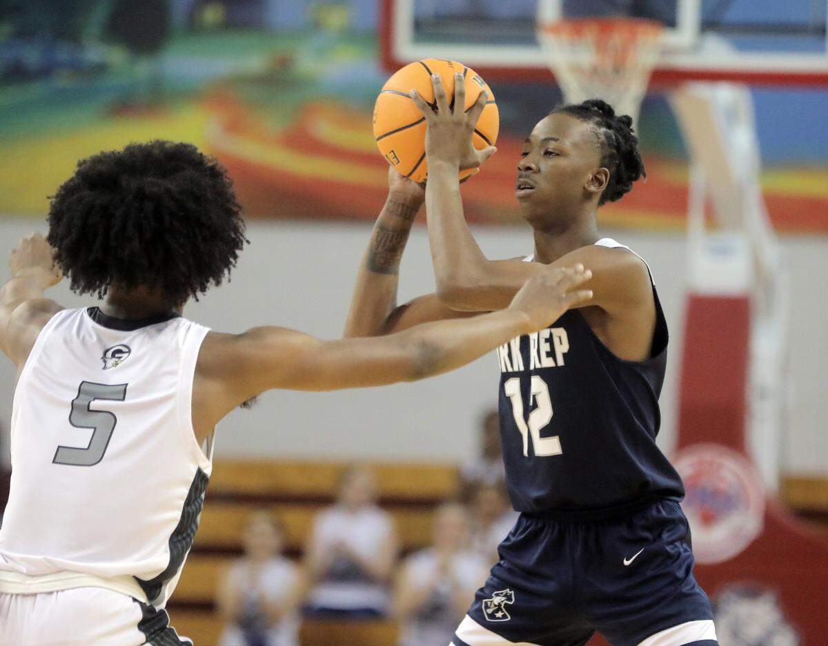 York Prep’s Ji’Meion Brown looks for an opening against Gray’s Avante Parker.