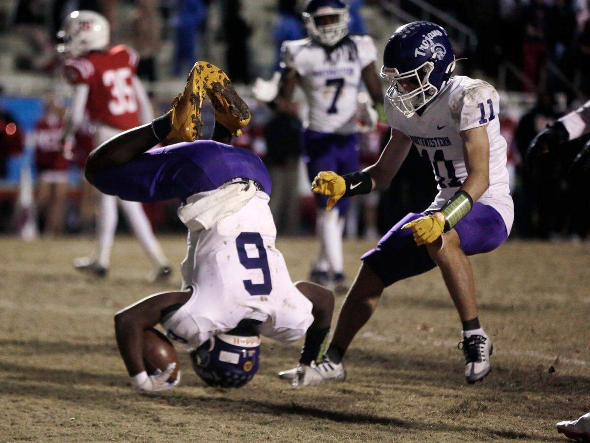 Northwestern’s Zilon Arnold (6) scores a touchdown as Greer Hopkins watches Friday at the upperstate championship game in Greenville.