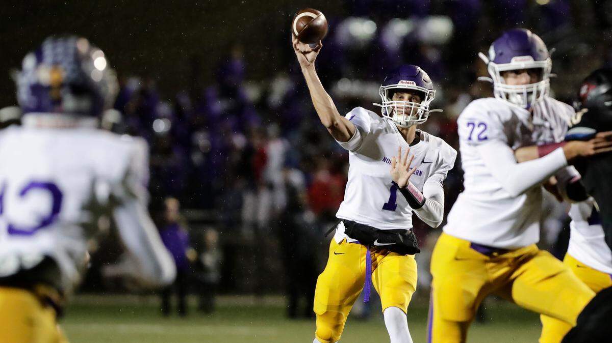 Northwestern quarterback (1) Will Mattison delivers a pass in first half play as Northwestern takes on Rock Hill in Friday night varsity football action, 10-29-2021.