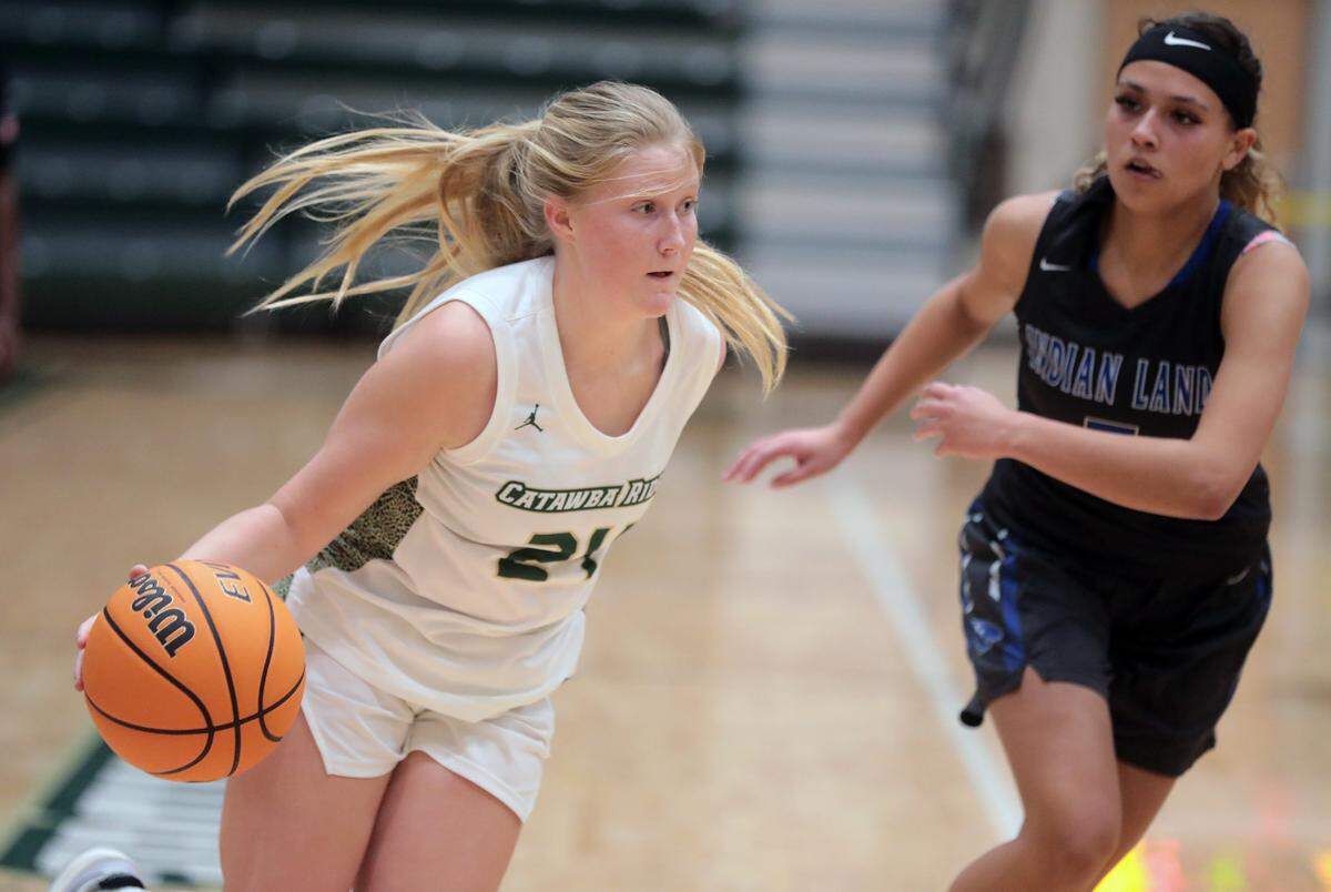 Catawba Ridge’s Kiley McManemin heads to the basket around Indian Land’s Carolina Terry.