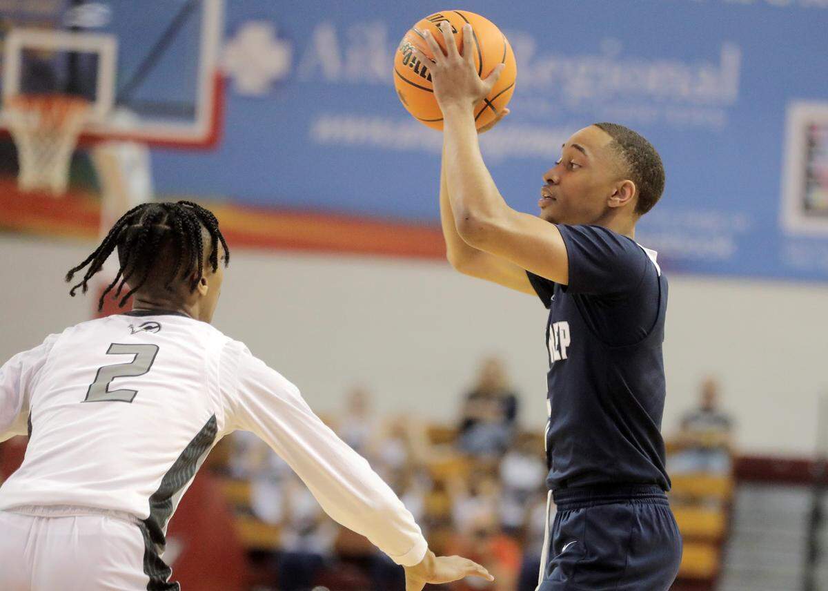 York Prep’s Ladarian McCree looks for an opening against Gray’s Jalen Jefferson.