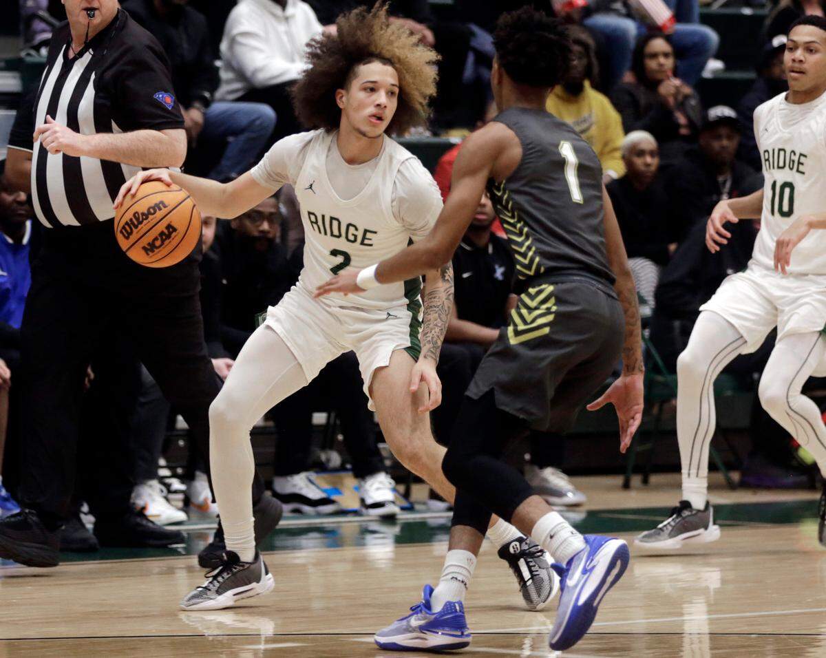 Catawba Ridge’s Zyan Hager looks for an opening around Indian Land’s Sincere Rasul (1)