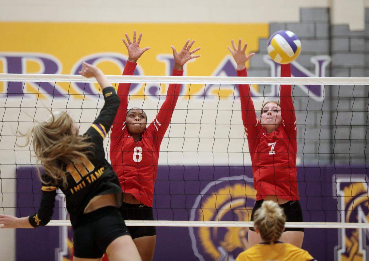 South Pointe’s Icesis Gaston (8) and Ryliegh Ferguson (7) go for the ball against Northwestern’s Sydney Bell (10).