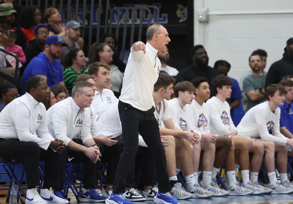 Fort Mill High School head boy’s basketball head coach Myron Lowery yells during the game against Indian Land Wednesday in Fort Mill.