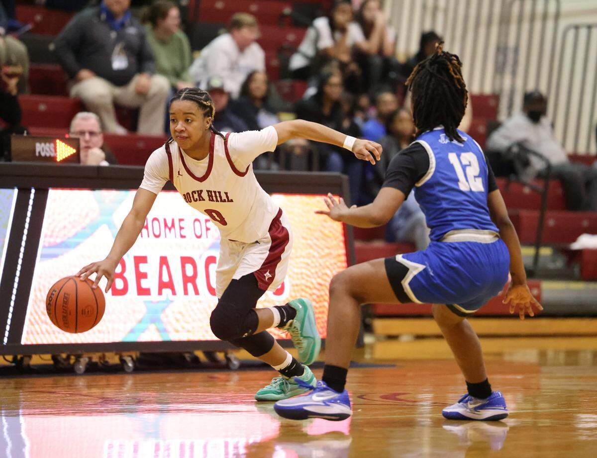 Rock Hill’s Aubrey Stevenson heads up the court against Byrnes’ Chassidy Rookard.