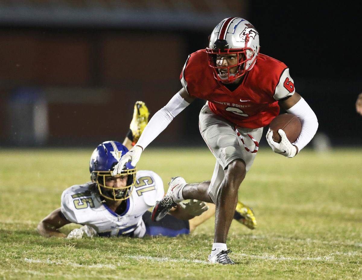 Quan Peterson breaks a tackle and subsequently takes his one punt return on the day to the end zone in South Pointe’s win over Indian Land Friday night (Oct. 15, 2021).