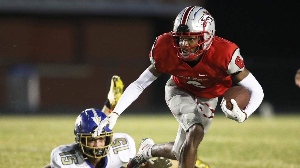 Quan Peterson breaks a tackle and subsequently takes his one punt return on the day to the end zone in South Pointe’s win over Indian Land Friday night (Oct. 15, 2021).