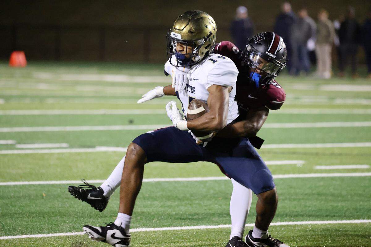 Rock Hill’s Kaiden Watkins brings down Spartaburg’s Justin Rice.
