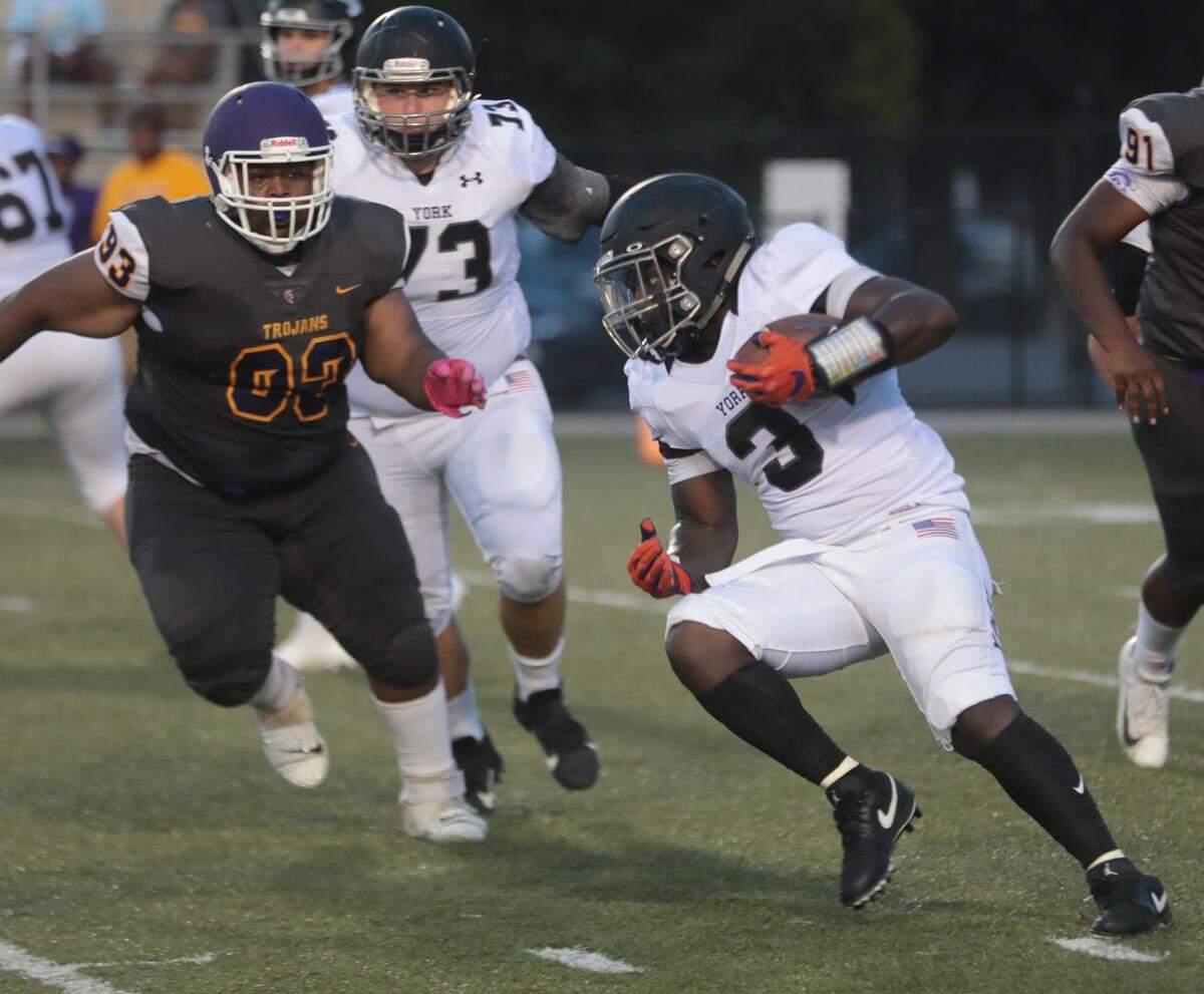 York’s Frank Thompson carries the ball Friday at the WRHI Kickoff in Rock Hill.