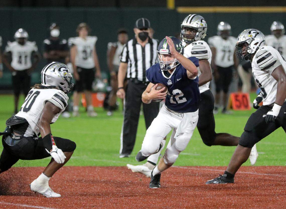 Legion Collegiate’s Andrew Turner tries to avoid Gray Collegiate Academy’s Tory Kelly.